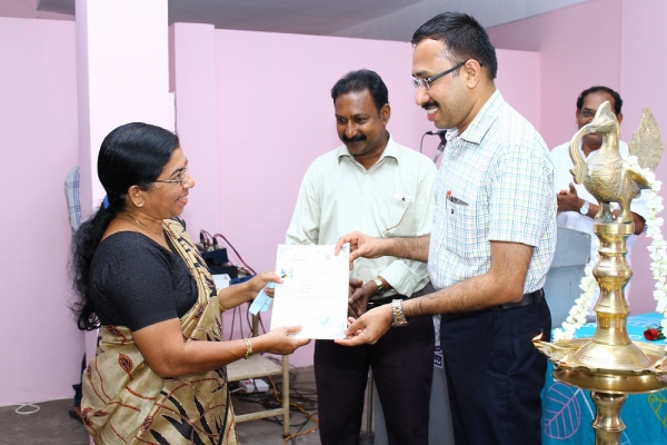 Pathanamthitta District Collector distributing certificate